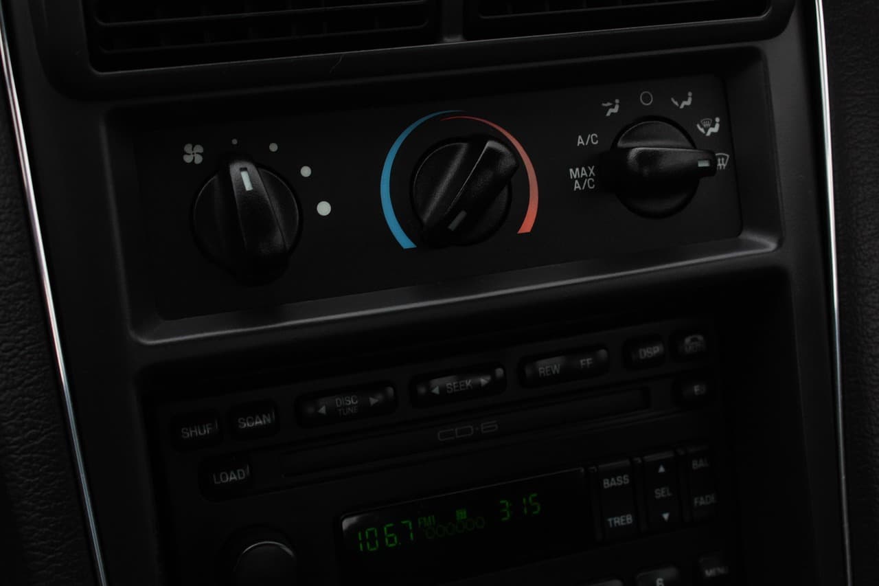 Air conditioning controls on a car dashboard